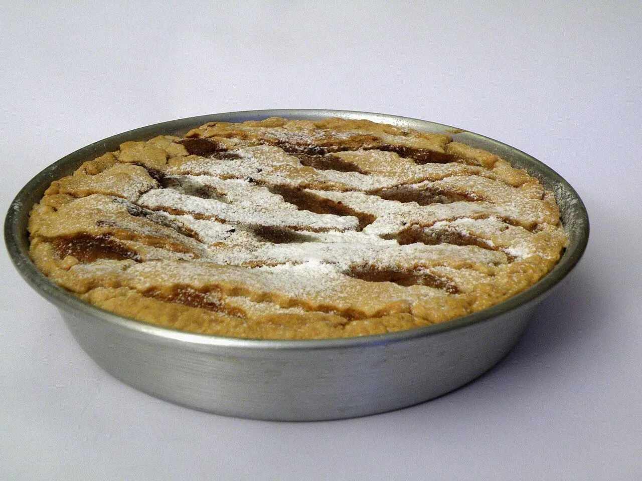 A pastiera napoletana , just made, still in the skillet. A cake of Napoli's tradition.